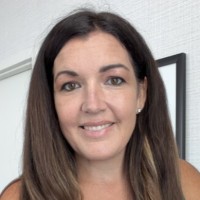 Professional headshot of Leah Miller, Founder and CEO of Firmly Profits.