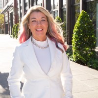 Professional headshot of Melissa Rogozinski, CEO of RPC Strategies, wearing a white blazer outdoors.